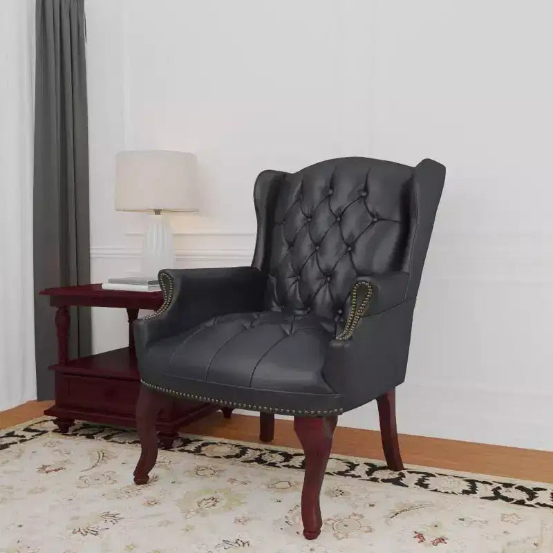 Poltrona per gli ospiti Wingback in vinile nero, monoposto
